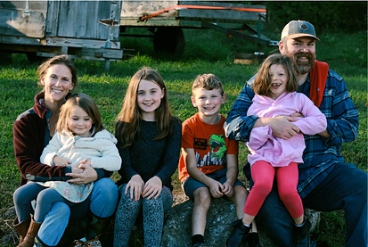 smiling family of 6