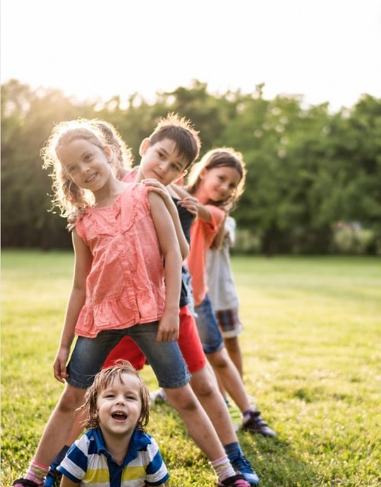 kids playing on sunny day outside