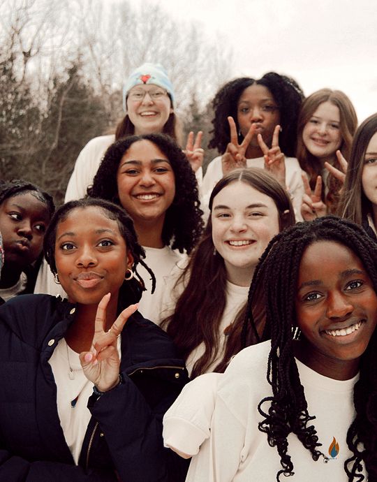 Big group of smiling teenage girls