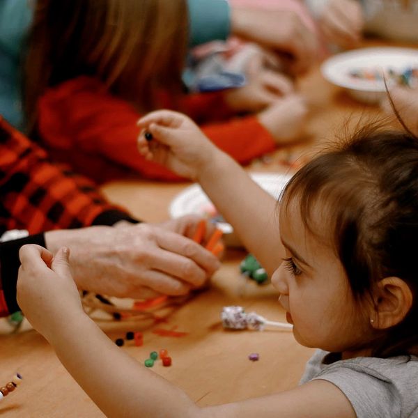 Kids doing crafts at table