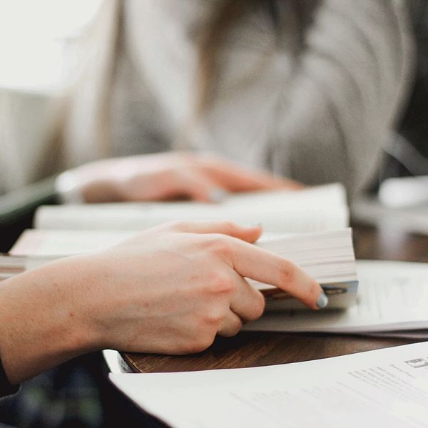 closeup of person reading a bible