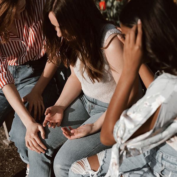 women praying in circle