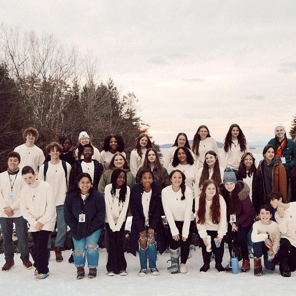 Youth group camp outside in the winter