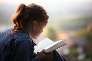 young girls reading passages from the bible